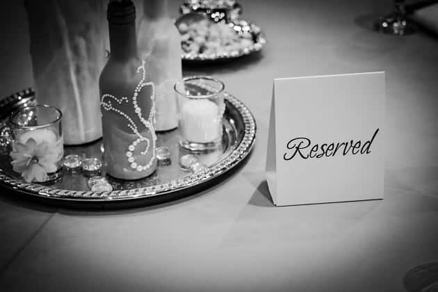 Black and white photo of a reserved place at a table