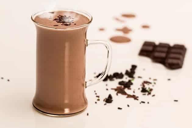 A hot chocolate and a chocolate bar