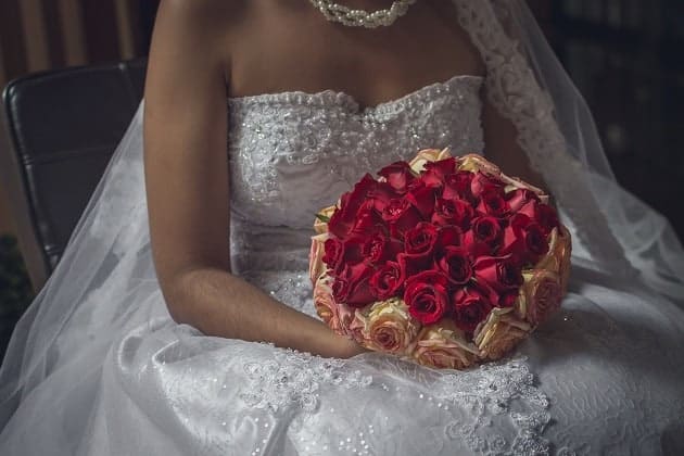 Bride holding flowers